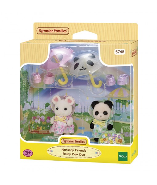 Duo des bébés en habits de pluie