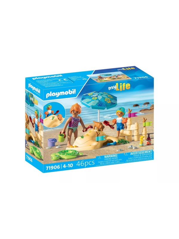 My life - Famille jouant dans le sable à la plage